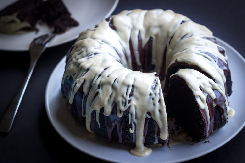 Sliced Irish Car Bomb Bundt Cake In a White Plate