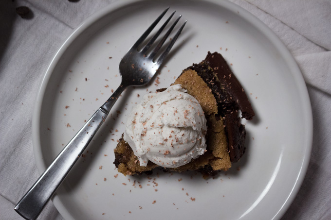 Top View of Sliced Paleo Skillet Brookie with Ice Cream in a Plate with Fork