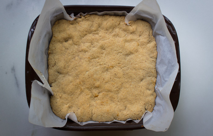 Overhead view of baked shortbread in a baking pan